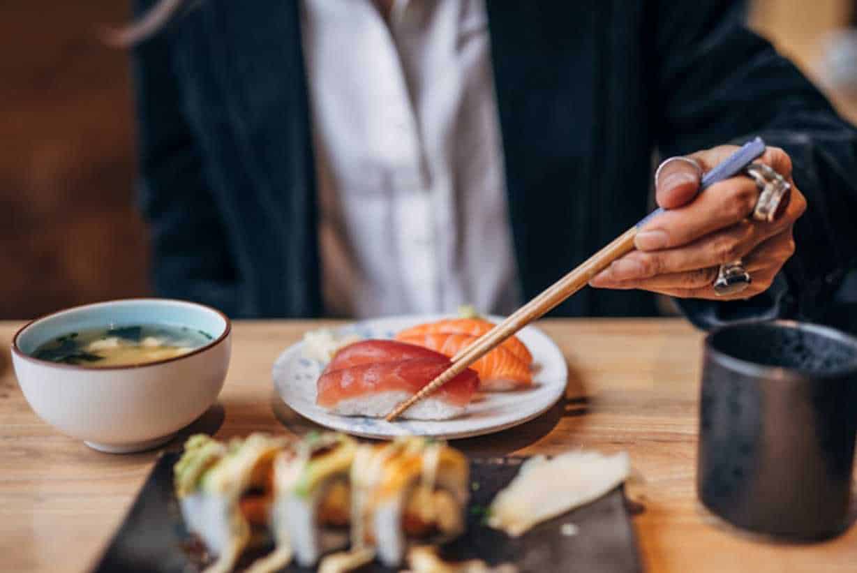 eating sushi with a fork